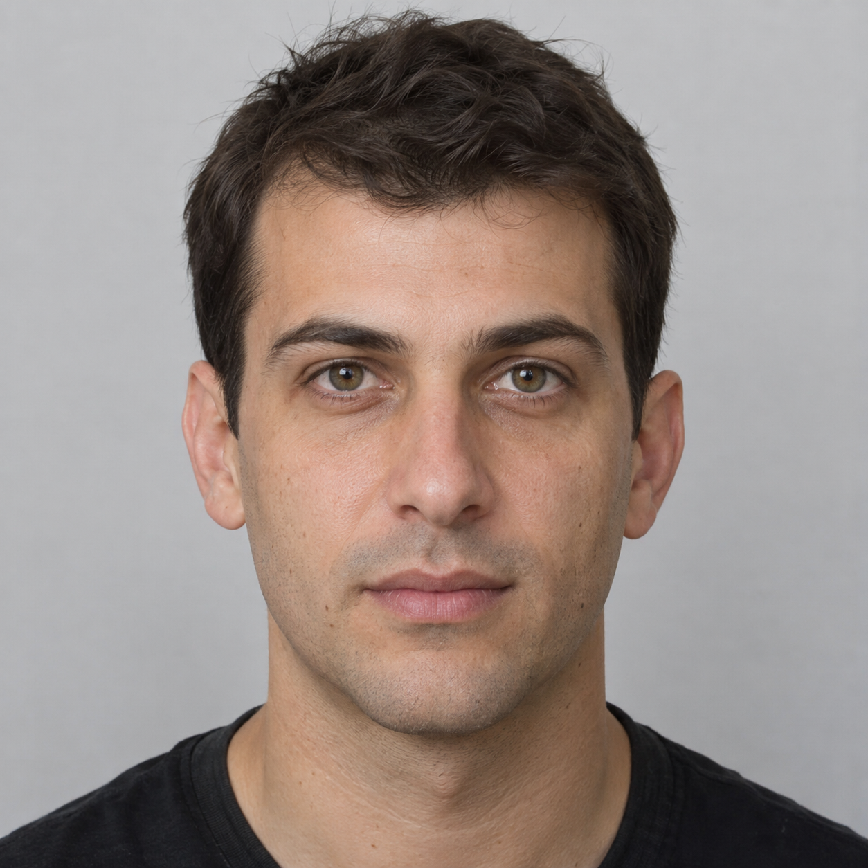 Fictional adult man with short dark hair, photographed facing the camera; the input used for this dance video